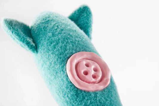 ButtonGloom™ Coral Plush Companion
